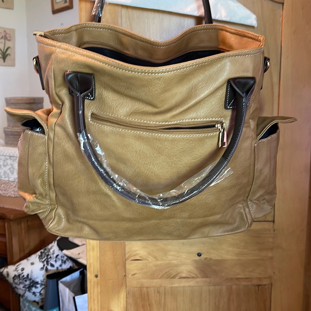 Light brown and dark brown purse with 2 side pockets
